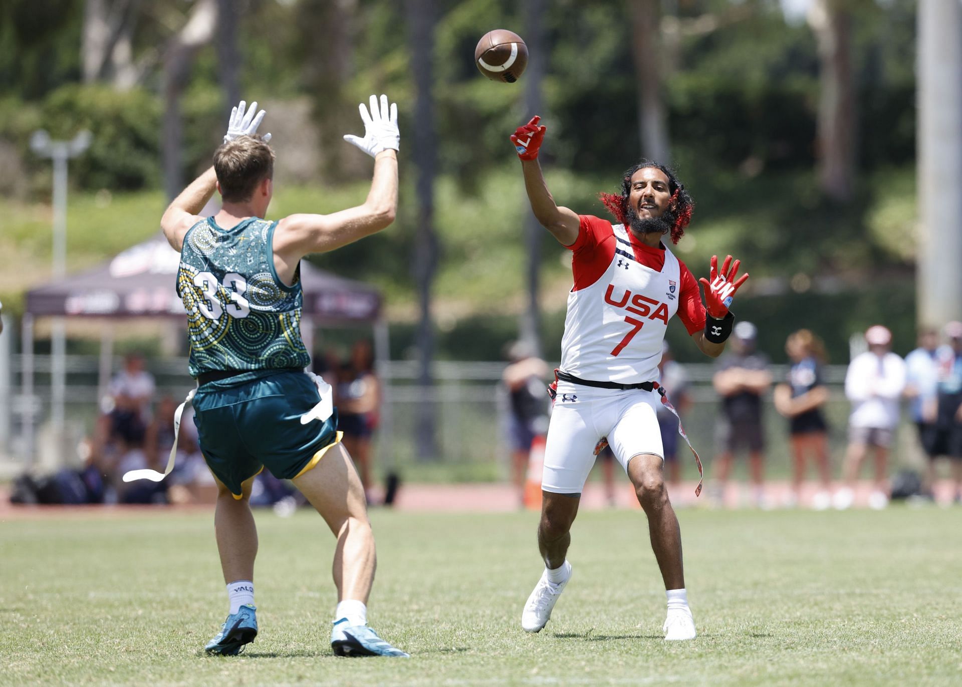 Darrell Doucette (R) is a quarterback for the U.S Team - Source: Getty